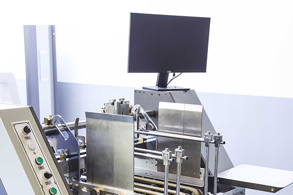 糊盒機(jī)在工作過程中出紙不順暢怎么辦？